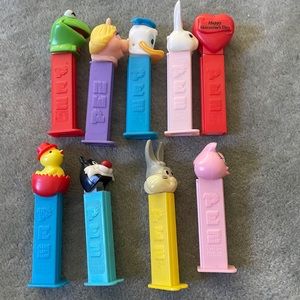 Nine collectible pezz candy dispensers